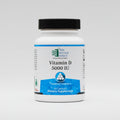 Supplement bottle labeled 'Vitamin D 5000 IU' by Ortho Molecular Products on a white background