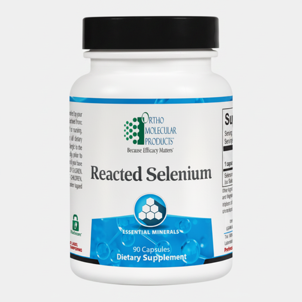 Supplement bottle labeled 'Reacted Selenium' by Ortho Molecular Products on a white background