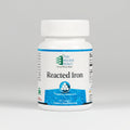Supplement bottle labeled 'Reacted Iron' by Ortho Molecular Products on a white background