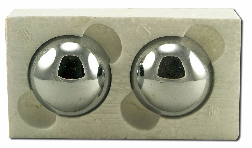 Two polished Acuspheres 45 mm reflex balls in their package