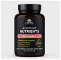 A bottle of Ancient Nutrition B-Complex dietary supplement, featuring a dark amber brown bottle and a black label with white and pink text.
