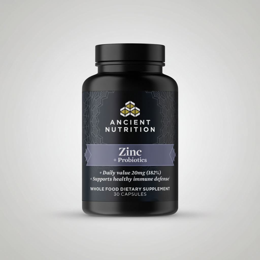 Black supplement bottle labeled 'Ancient Nutrition Zinc + Probiotics' on a white background