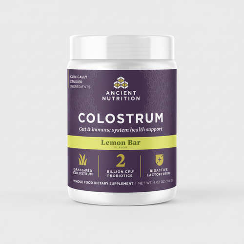 Ancient Nutrition Colostrum supplement container with purple label on a white background
