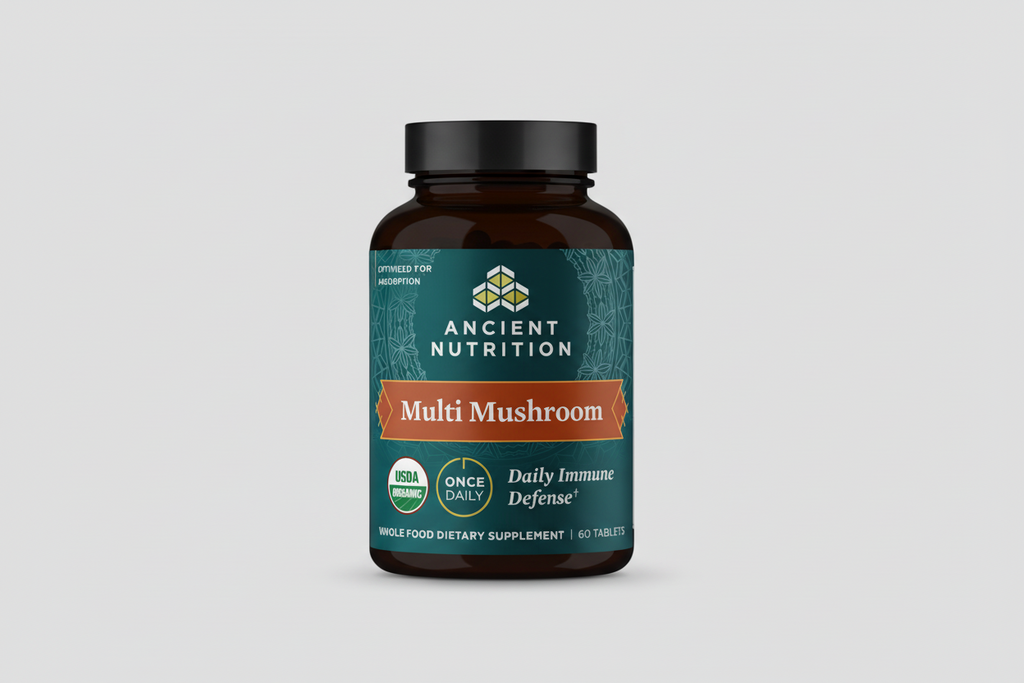 Supplement bottle labeled 'Ancient Nutrition Multi Mushroom' on a white background