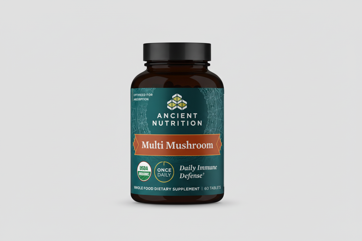 Supplement bottle labeled 'Ancient Nutrition Multi Mushroom' on a white background