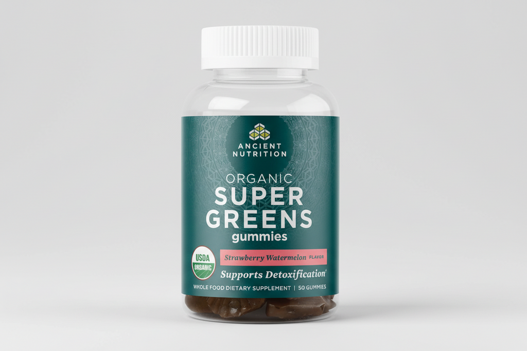 Bottle of Ancient Nutrition Organic Super Greens gummies on a white background