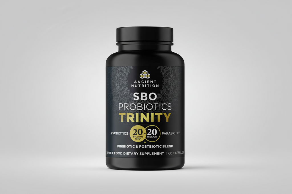 Black supplement bottle labeled 'SBO Probiotics Trinity' by Ancient Nutrition on a white background