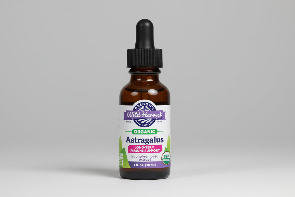 Bottle of Oregon's Wild Harvest Astragalus supplement with dropper on a white background