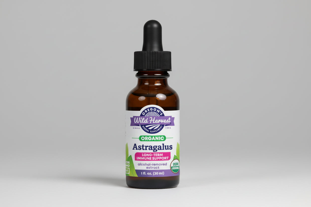 Bottle of Oregon's Wild Harvest Astragalus supplement with dropper on a white background