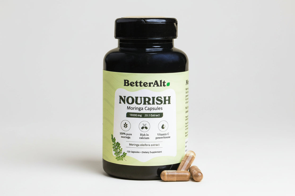 Supplement bottle labeled 'BetterAlt Nourish Moringa Capsules' with capsules on a white background