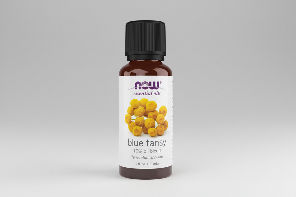 Bottle of NOW Essential Oils Blue Tansy oil blend on a white background