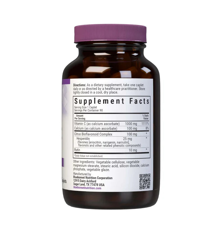 Supplement bottle with purple cap and label on a white background
