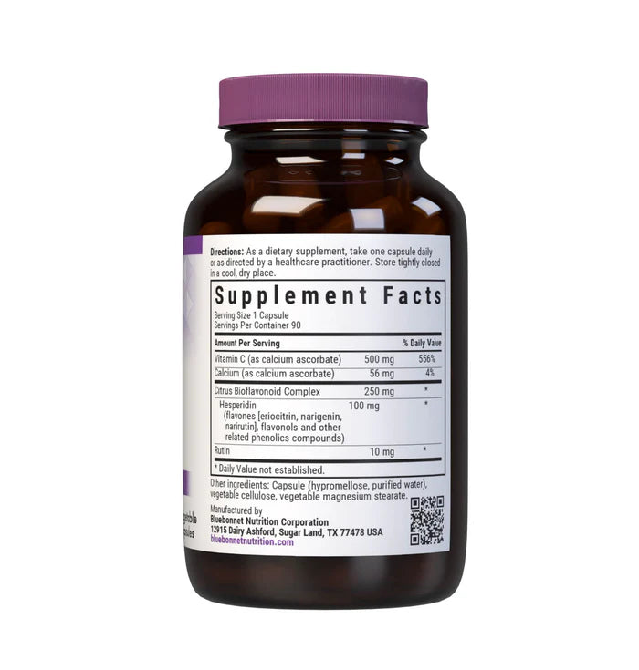 Brown supplement bottle with purple cap and label on a white background