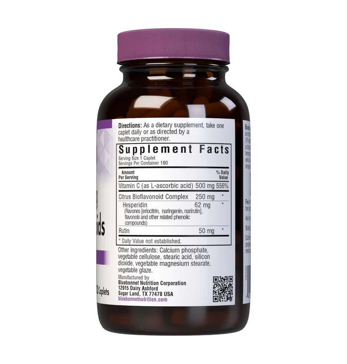 Supplement bottle with purple cap and label on a white background