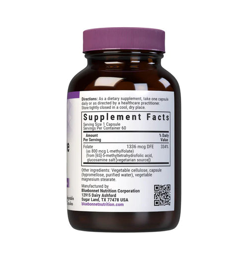 Supplement bottle with purple cap and label on a white background