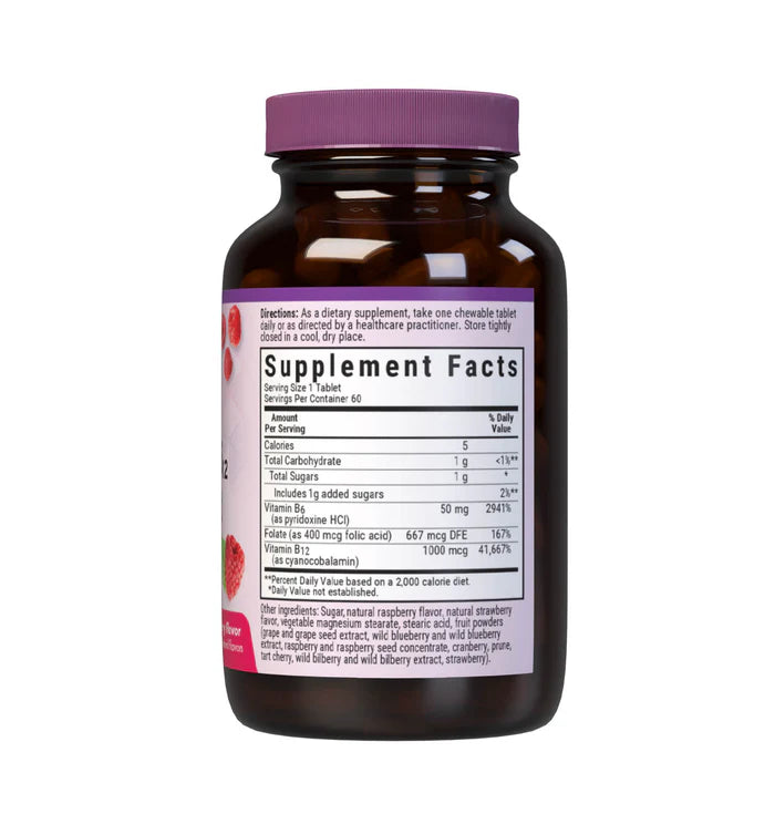 Vitamin supplement bottle with purple cap and label on a white background