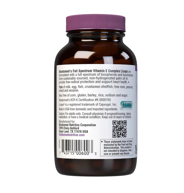 Vitamin supplement bottle with purple cap and label on a white background