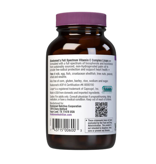 Vitamin supplement bottle with purple cap and label on a white background