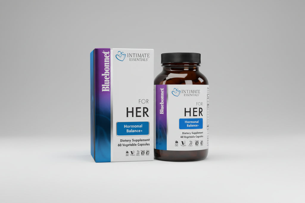 Supplement bottle and packaging labeled 'For Her' on a gray background
