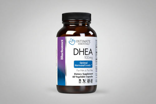 Bottle of DHEA supplement with label on a gray background