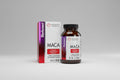 Maca supplement bottle and packaging on a gray background