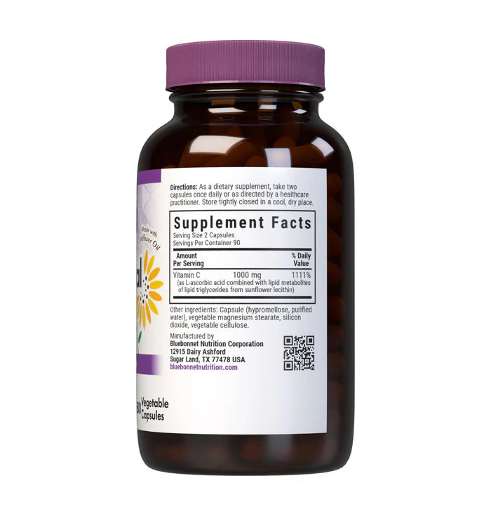 Vitamin supplement bottle with purple cap and label on a white background