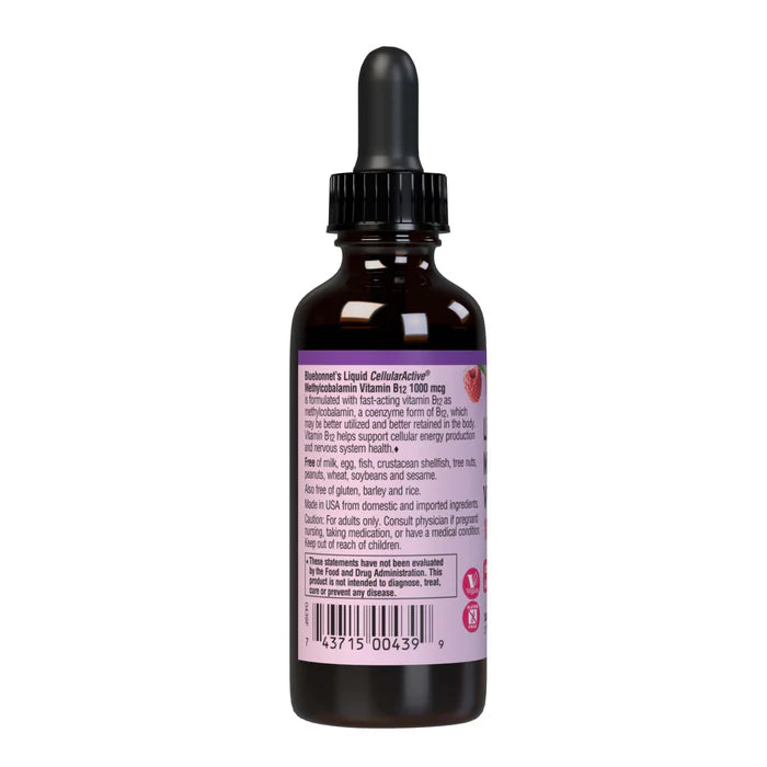 Bottle of liquid supplement with dropper on a white background