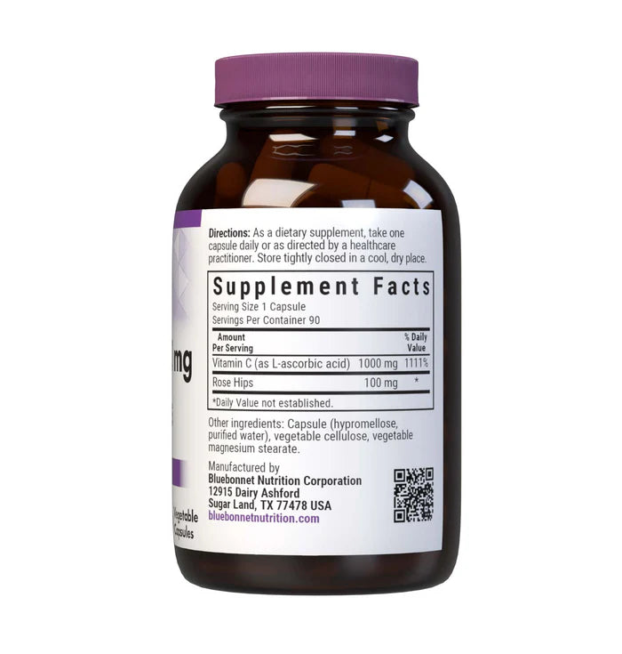 Vitamin supplement bottle with purple cap and label on a white background