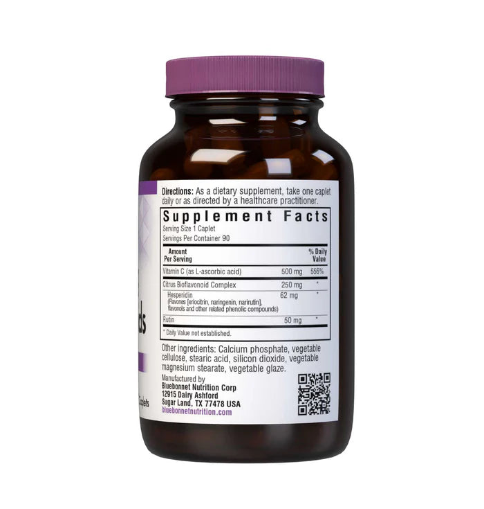 Brown supplement bottle with purple cap and label on a white background