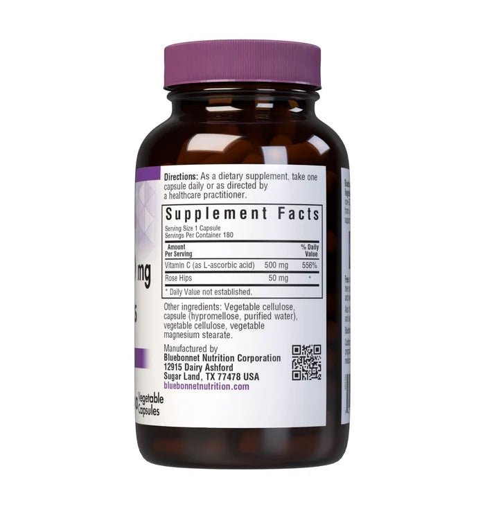 Supplement bottle with purple cap and label on a white background