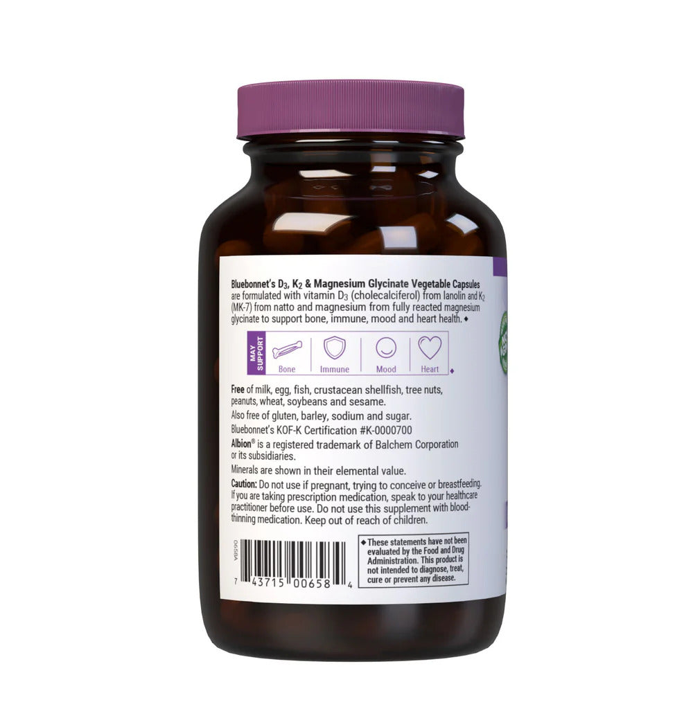 Brown supplement bottle with purple cap on a white background