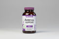 Supplement bottle labeled 'Adrenal Support' by Bluebonnet on a white background