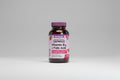 Supplement bottle labeled 'Bluebonnet Vitamin B12 & Folic Acid' on a white background
