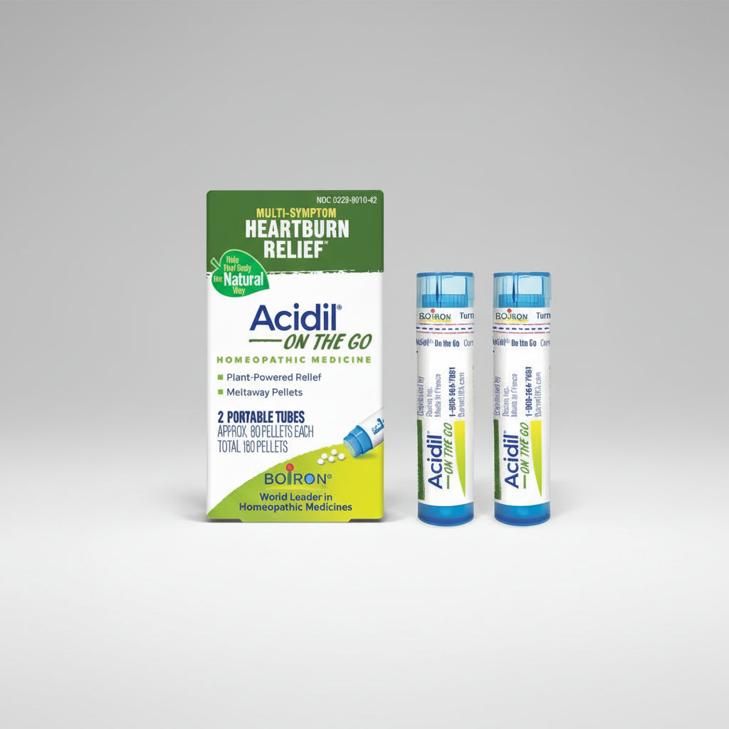 Acidil on the Go homeopathic medicine packaging with two portable tubes on a white background