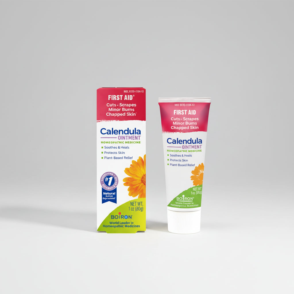 Calendula ointment packaging with tube and box on a white background