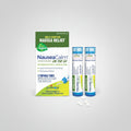 NauseaCalm on the Go homeopathic medicine packaging with two portable tubes and pellets on a white background.