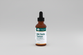 Bottle of Genestra Milk Thistle Tincture on a white background