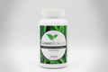 Supplement bottle labeled 'Green for Life Absolute Enzymes' on a light gray background