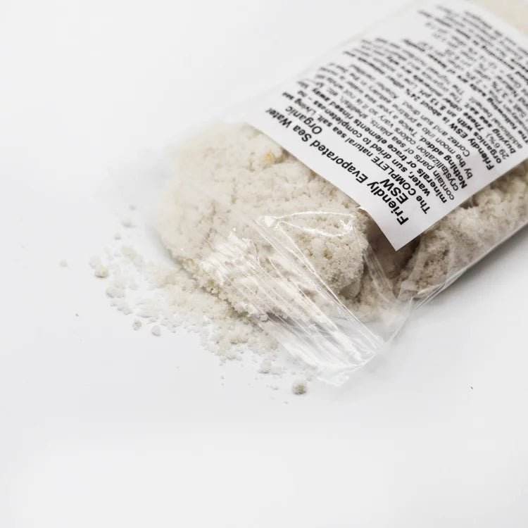 Clear plastic bag with Epsom salt on a white background