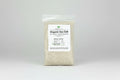 Bag of organic sea salt with a label on a white background