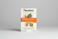 Himalaya Koflet Lozenge packaging with ginger, cinnamon, and clove on a white background