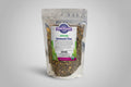 Bag of Oregon Wild Harvest Immuni-Tea with a wooden bowl of tea leaves on a white surface.