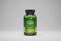 Irwin Naturals Aloe & Triphala Active-Cleanse and Probiotics supplement bottle on a white background