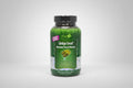 Vitamin supplement bottle labeled 'Ginkgo Smart' with green grass on top, Irwin Naturals branding visible.