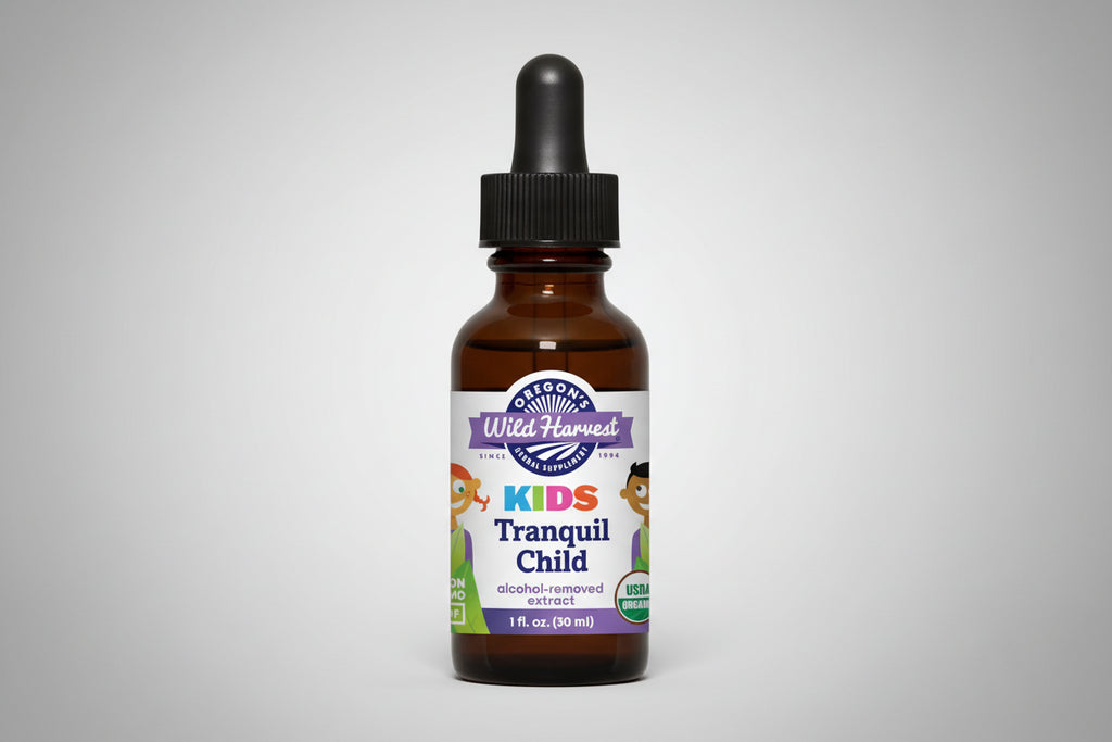 Bottle of Oregon's Wild Harvest Kids Tranquil Child supplement with dropper on a white background