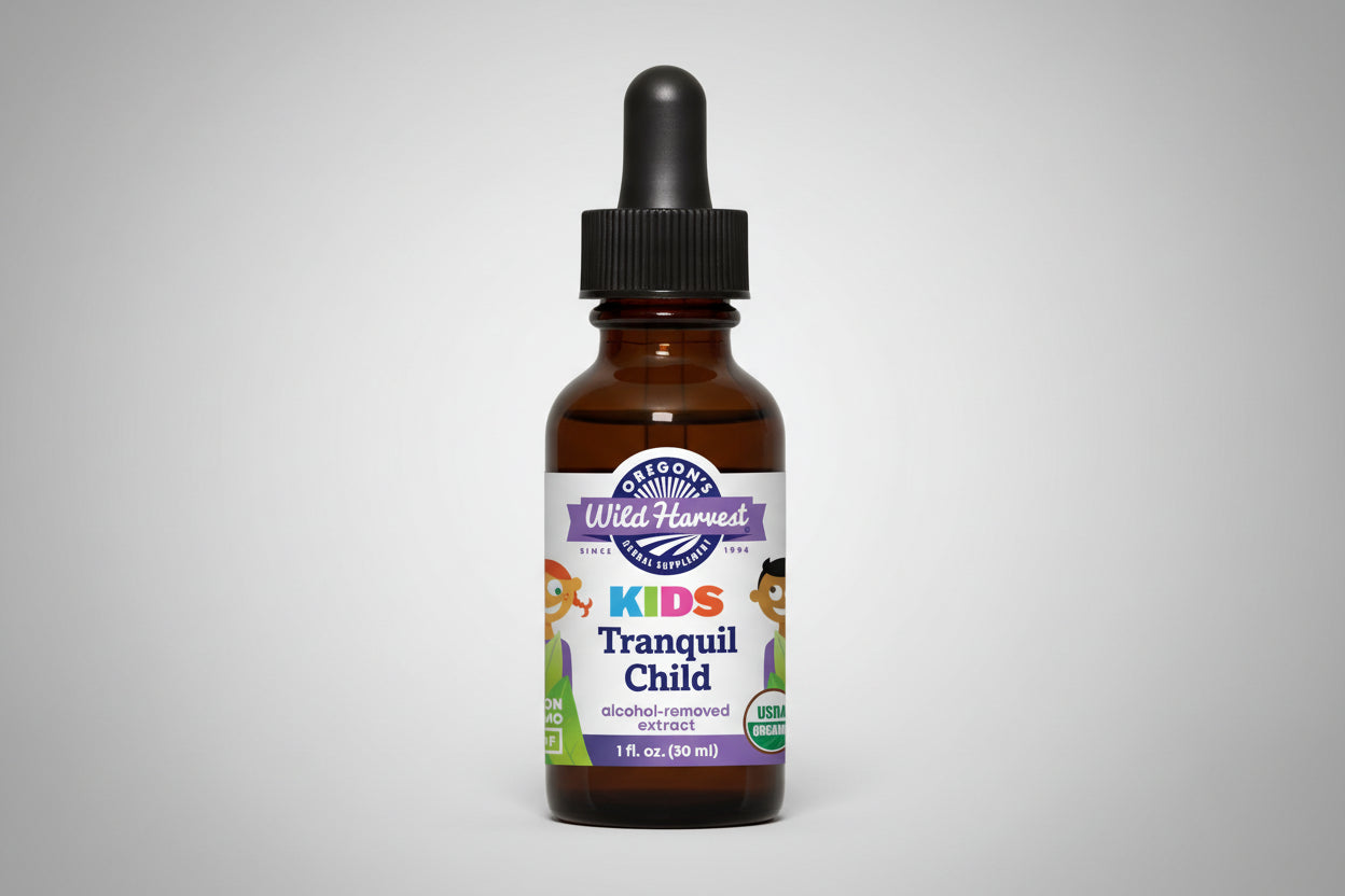 Bottle of Oregon's Wild Harvest Kids Tranquil Child supplement with dropper on a white background