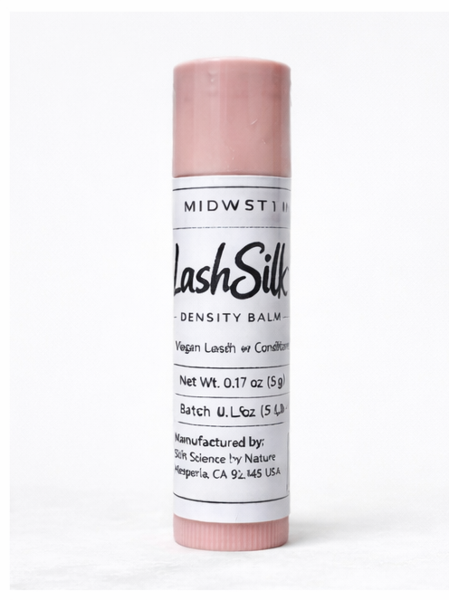 Lash Silk Density Balm stick with pink cap and white label on a white background