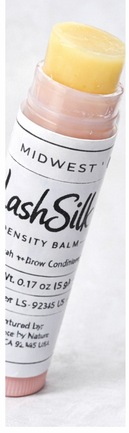 LashSilk intensity balm with yellow cap on a white background