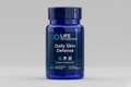 Life Extension Daily Skin Defense supplement bottle on a black background
