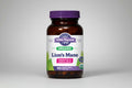 Oregon's Wild Harvest Lion's Mane supplement bottle with purple cap and label.